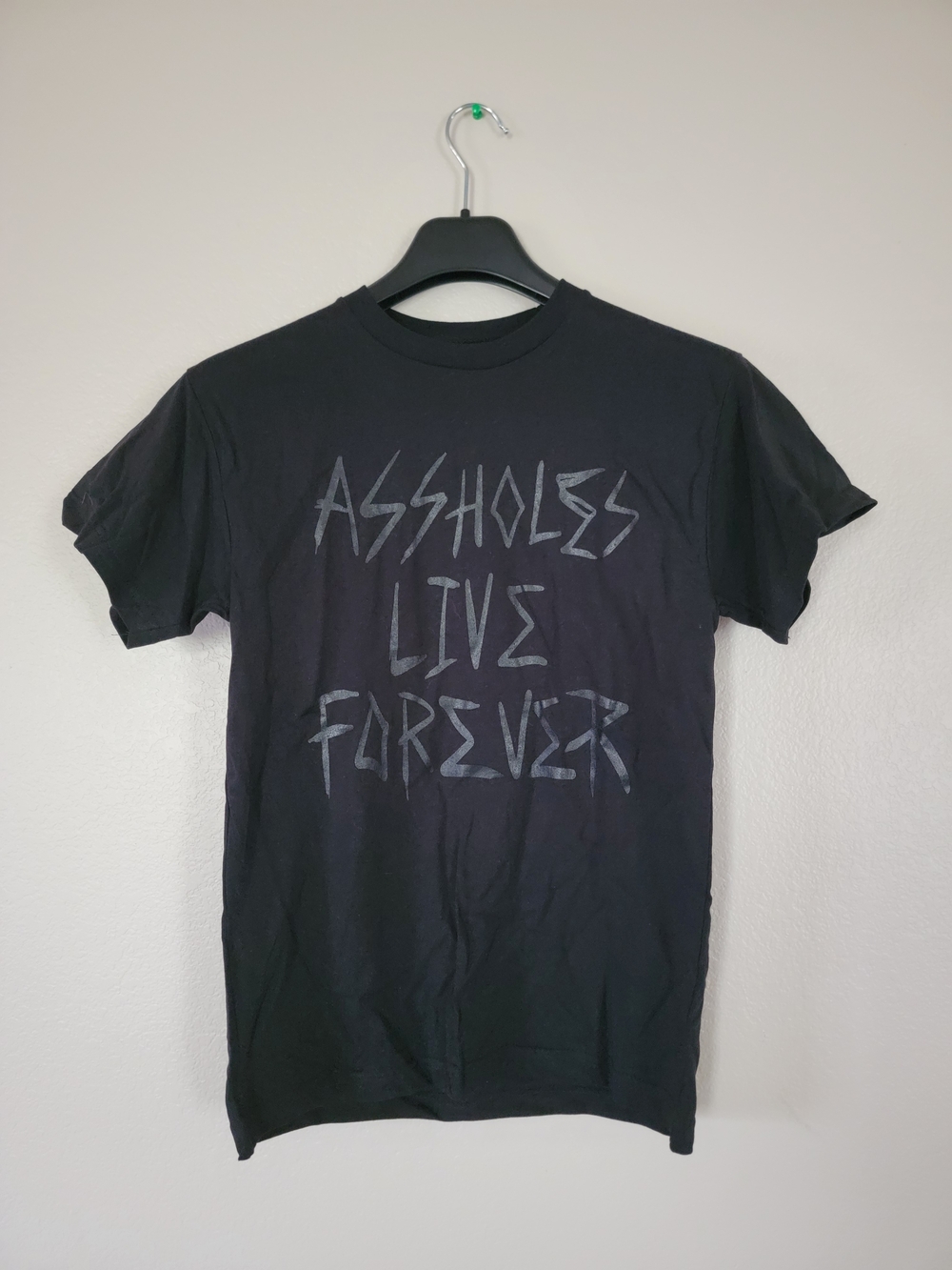 Black Graphic Short-Sleeve Tee with 'Assholes Live Forever' Print